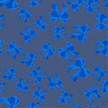 Beautiful blue bows on a gray backdrop. Seamless background