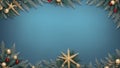 Beautiful blue Christmas background with a border of fir branches, golden and silver baubles, pine cones Royalty Free Stock Photo