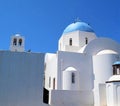 Beautiful blue domed and white buildings in Santorini, Greece Royalty Free Stock Photo