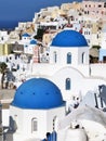 Beautiful blue domed and white buildings in Santorini, Greece Royalty Free Stock Photo