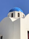 Beautiful blue domed and white buildings in Santorini, Greece Royalty Free Stock Photo
