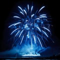 Beautiful blue fireworks on the black sky background. Royalty Free Stock Photo