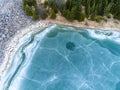 Beautiful blue frozen crystal clean lake aerial drone view