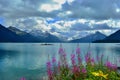 Beautiful blue Garibaldi Lake surrounded by high mountains covered with glacier. Royalty Free Stock Photo