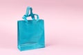 Beautiful blue gift bag on a pink background Royalty Free Stock Photo