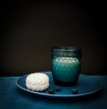 Beautiful blue glass of milk with marshmallows  and blueberries on a dark background Royalty Free Stock Photo