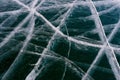 Beautiful ice of Lake Baikal with abstract cracks