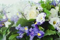 Beautiful blue iris flower with lush leaves, white hydrangea, delicate cream roses. Summer wedding concept background Royalty Free Stock Photo