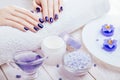 Beautiful blue manicure with spa essentials Royalty Free Stock Photo