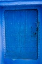 Blue door in the Beautiful blue medina of Chefchaouen city in Morocco, Africa. Royalty Free Stock Photo