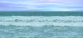 beautiful blue ocean, sea waves with foam fabulous sea tide, blue sky with clouds, concept transcendence, water sports, lack