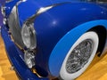 Beautiful blue retro car in salon, closeup