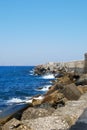 Beautiful blue sea and playful waves under the blue sky