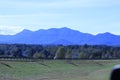 Blue skies with clouds over mountains. Royalty Free Stock Photo