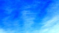 Beautiful blue sky backing shot with clean smoot clouds. Royalty Free Stock Photo