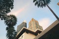 Beautiful blue sky with clouds reflecting in windows, banner design. Low angle view of modern buildings on sunny day Royalty Free Stock Photo