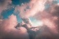 Beautiful blue sky with cumulus rainy pink clouds, abstract background, copy space Royalty Free Stock Photo