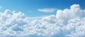 Beautiful blue sky filled with fluffy white cumulus clouds Royalty Free Stock Photo