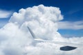 beautiful blue sky with soft clouds and plane wing as abstract background, aerial view Royalty Free Stock Photo