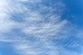 Beautiful blue sky with whispy lines of white clouds Royalty Free Stock Photo