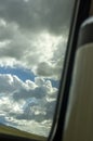 Beautiful blue sky and white clouds outside the train window Royalty Free Stock Photo