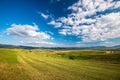 Beautiful blue sky with white clouds over green agricultural fields Royalty Free Stock Photo