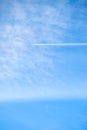 Beautiful blue sky and white clouds in summer season with transportation airplane movement high speed jet air traffic track on bac