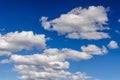 Beautiful blue sky with white fluffy clouds