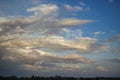 Beautiful blue sky with wispy white cumulus clouds