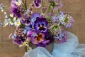 Beautiful blue violet pink purple bouquet by florist with pansy flowers. Floral background Royalty Free Stock Photo