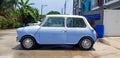 Beautiful Blue and White classic Mini cooper parked on the street or road Royalty Free Stock Photo