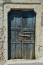 Beautiful Blue Wooden Door Of A Typical House In Pyrgos Kallistis On The Island Of Santorini. Travel, Cruises, Architecture, Lands Royalty Free Stock Photo