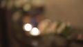 Beautiful blurred out defocused shot on ayurveda heaing meditation buddhism items tibetian singing bowl candles on table