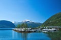 Beautiful boat marina in Valldal, Norway and fjord and mountains Royalty Free Stock Photo