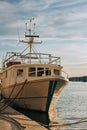 Beautiful boat in the sea near Trogir old town, Croatia in a sunny day. Travel destination in Croatia Royalty Free Stock Photo