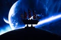 Beautiful boat toy over a blue balll with blurred blue planet and cosmos scene at background Royalty Free Stock Photo