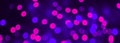 Beautiful Bokeh Purple and blue light Background. Panoramic Decorative Holiday Texture. Backdrop for design. Blurred Festive light Royalty Free Stock Photo