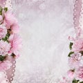 Beautiful borders of pink roses on a gentle romantic vintage background with space for text or photo