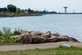 Beautiful boulders making up a wave breaker protecting the coastline outside Landskrona in southern Sweden. Backlit blue Royalty Free Stock Photo