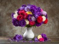 beautiful bouquet of autumn asters on a wooden table