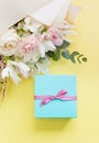 Beautiful bouquet and blue gift box Royalty Free Stock Photo