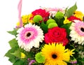 Beautiful bouquet of bright flowers in basket. Royalty Free Stock Photo