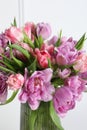 Beautiful bouquet of colorful tulip flowers in vase on white background Royalty Free Stock Photo