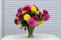 A beautiful bouquet of dahlias in a vase Royalty Free Stock Photo