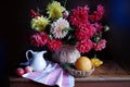 Beautiful bouquet of Dahlias in a vase on the table. Royalty Free Stock Photo