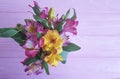 Beautiful bouquet of alstroemeria season on a wooden Royalty Free Stock Photo