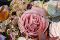 Big rose in wedding bouquet closeup background