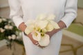 Beautiful bouquet of flowers in the hands of the bride Royalty Free Stock Photo