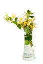 Beautiful bouquet of honeysuckle flowers in the transparent glass vase Royalty Free Stock Photo