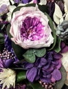 Beautiful bouquet of preserved flowers hydrangea, eucalyptus, purple and white peony roses. Dried flowers. Bouquet of spring